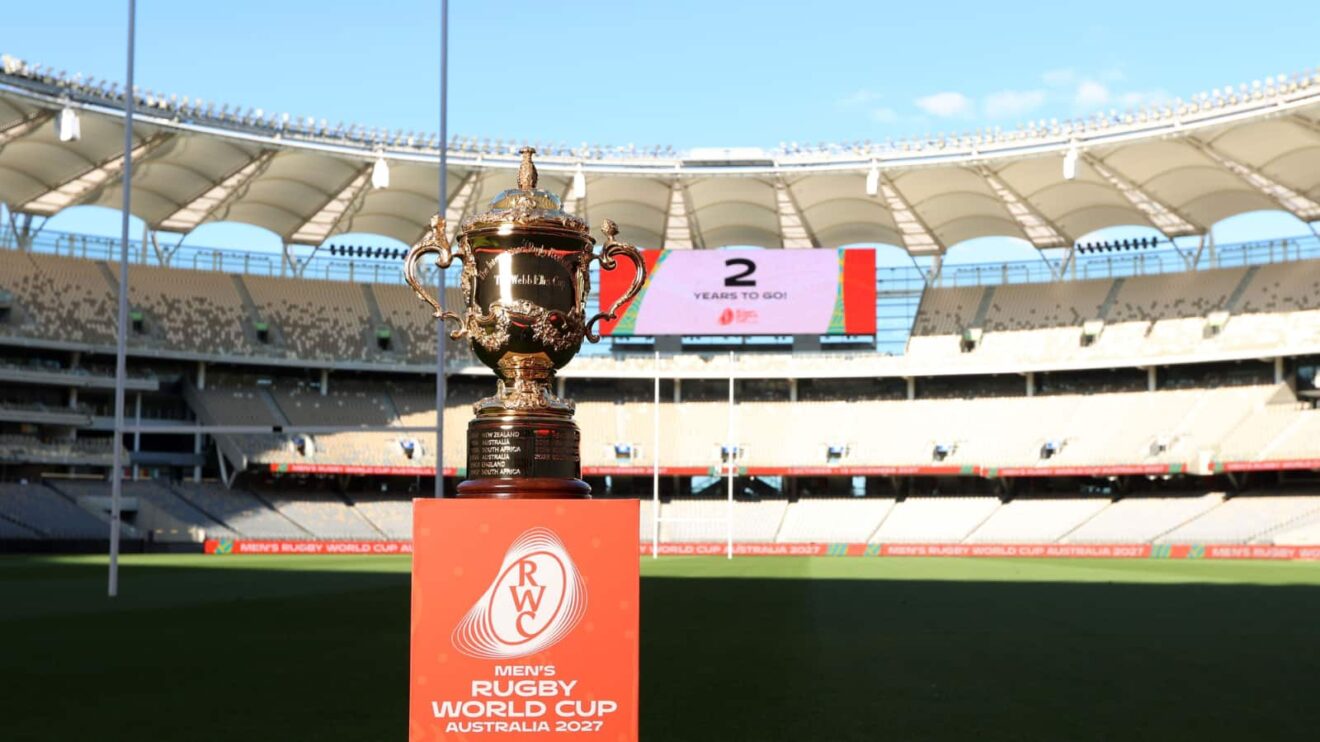 The William Webb Ellis Cup with branding for the 2027 Rugby World Cup. (via: World Rugby)